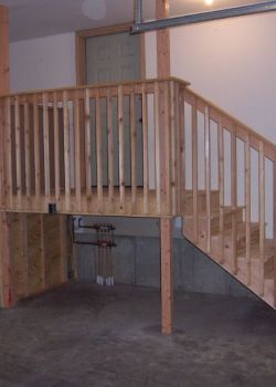 90 degree adjacent residential wheelchair lift project in garage complete with new landing and stairway
