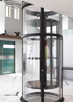 Vuelift Round Home Elevator Descends To Luxury Foyer