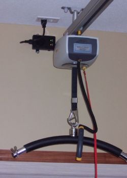Ceiling track lift - lifter unit at charge station - group home
