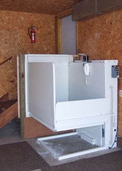Wheelchair lift in garage of private residence